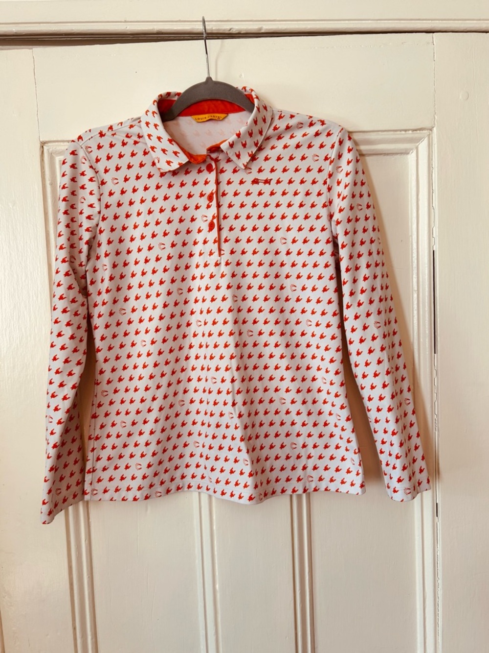 Louis Castel Orange and white women’s golf shirt bird pattern size large